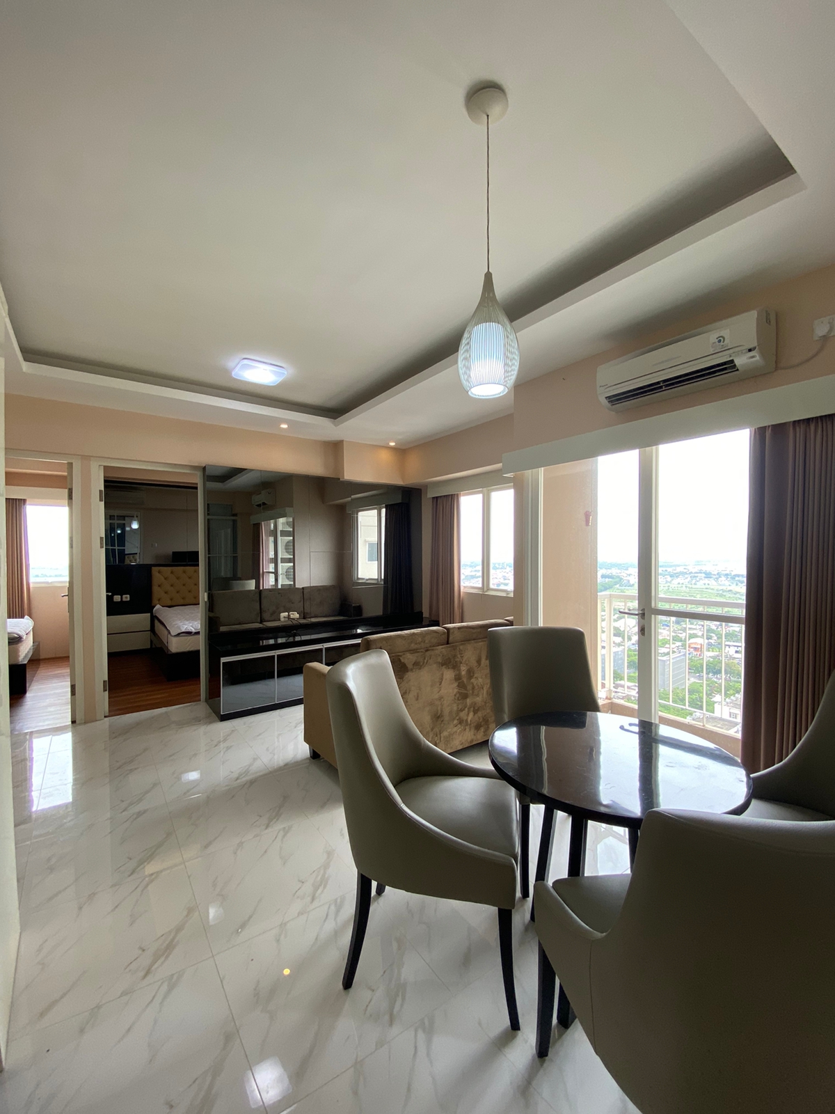 Disewakan Apartment Puncak Dharmahusada Surabaya Timur - Image 1