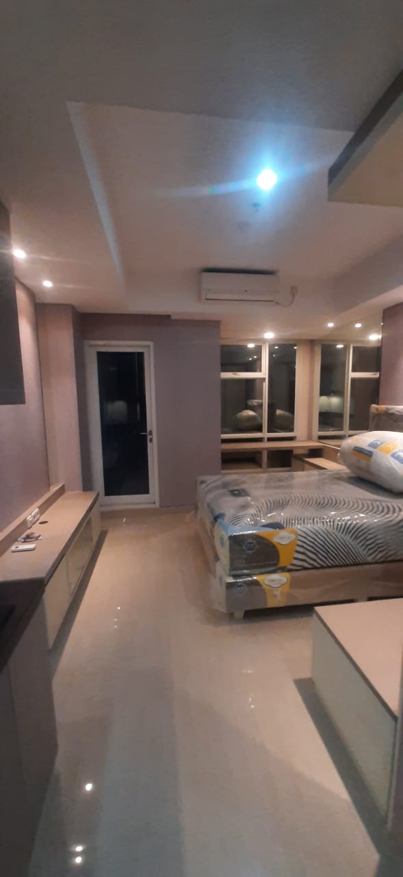 Sewa Apartemen Studio Mewah di Grand Sungkono Lagoon Surabaya Barat - Image 1